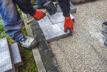 man installing concrete flooring